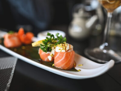 Salmon sushi rolls with cream close up.